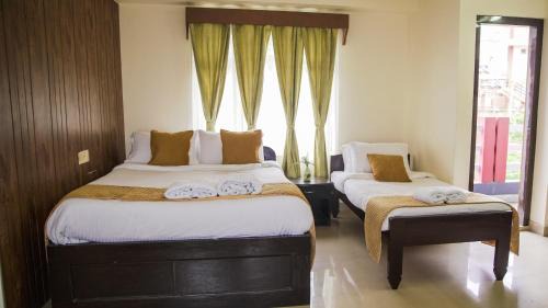 Deluxe Triple Room