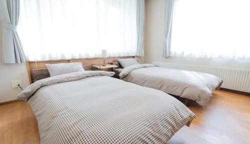 Twin Room with Shared Bathroom