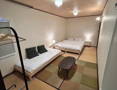 Queen Room with Shared Bathroom