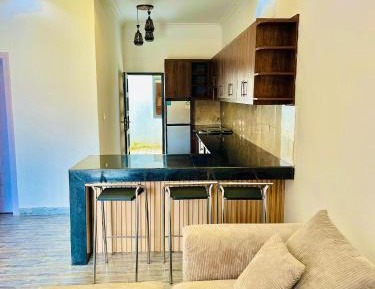 Four-Bedroom Apartment with Balcony 