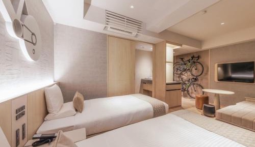 Superior Twin Bike Friendly Room With shower booth