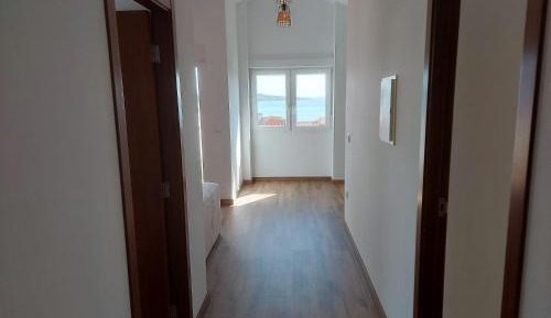 Three-Bedroom Apartment with Water View