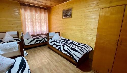 Economy Quadruple Room with Shared Bathroom