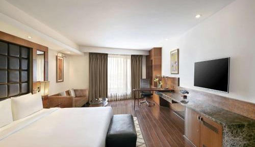 Business Class With Happy Hours 03:00 PM to 06:00 PM , Airport Transfers and Free Pick up and drop to Worldmark Aerocity (subject to car availability)