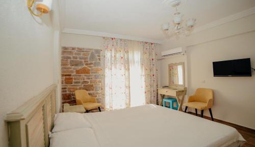 Deluxe Uc Kisilik Oda-Deniz Manzara