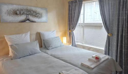 Twin Room with Shared Bathroom