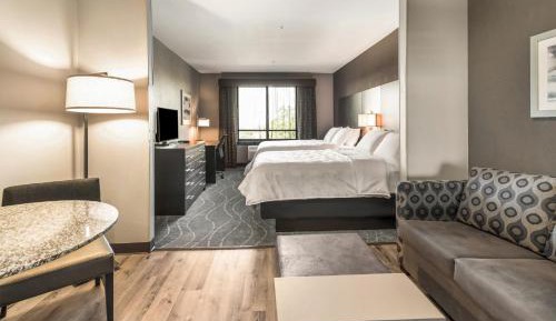 Queen Suite with Two Queen Beds and Sofa Bed