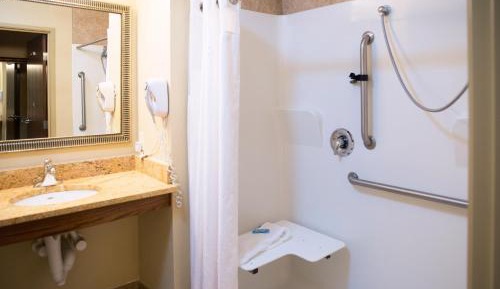 Queen Room with Two Queen Beds Hearing Accessible with Roll-In Shower - Non-Smoking