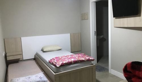 Double Room (1 Adult + 1 Child)
