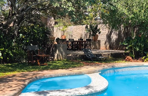 Victoria Falls House | Zambezi Boutique Lodge, 2 Suites ask for our free Savannah Adventures 4x4 Safari