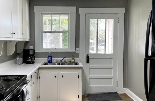 Douglas House | The Redbird - Charming 3-bedroom bungalow with All the Basics in Douglas