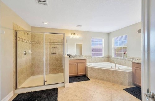 Live Oak Preserve House | Spacious 6 bedroom house with pool and grotto, movie theater room, AC and Wifi.