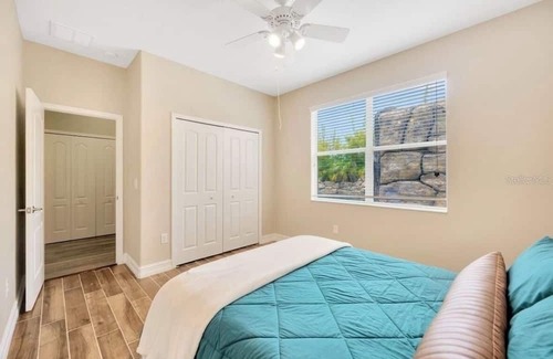 Live Oak Preserve House | Spacious 6 bedroom house with pool and grotto, movie theater room, AC and Wifi.