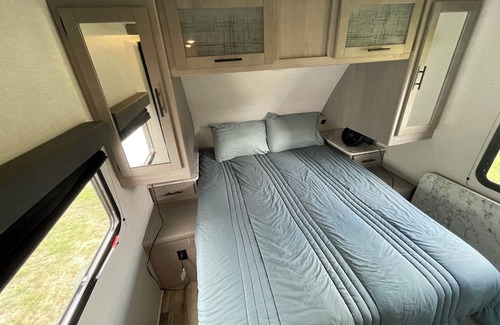 Lexington - Salisbury RV Rental | Come glamping in a Cozy 1-bedroom camper with double bunks and a sofa