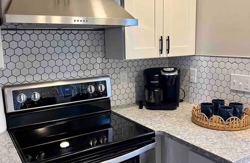 Rock Harbor House | New Remodeled Lakefront Home - Large Dock with Year Around Water!