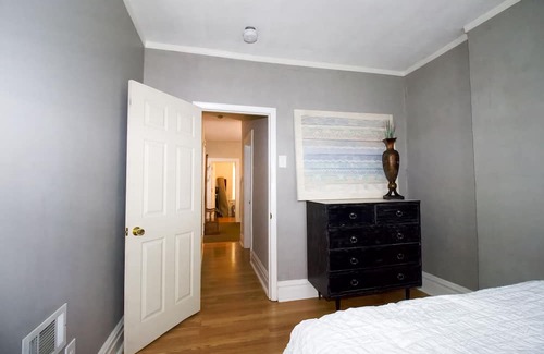 St. Louis Apartment | Charming Urban Cozy Retreat with a fireplace and backyard garden. Pet/Friendly!