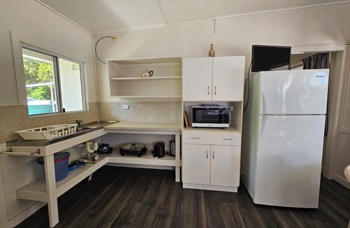 Cape Gloucester House | UNIT 1 SUNSET BEACH BUNGALOWS CAPE GLOUCESTER, ABSOLUTE BEACH FRONT