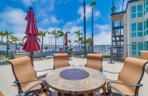 La Playa Condo | Coastal Yacht Club Elegance -book 30 days-pet friendly /fitness center/pool