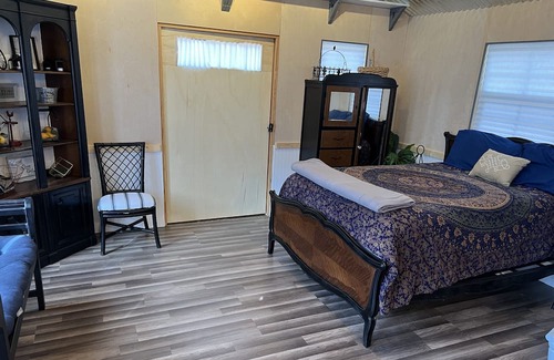 Jones Mills House | Very private studio with a deck overlooking the pond.