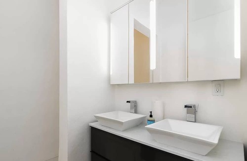 Rock Harbor Villa | Modern ocean side estate: 5 bed - 6 bath, big pool, 2 rooftops, small dock