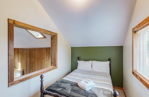 Newberry Shores House | Unique waterfront home with direct water access, dock, firepit, porch, W/D, AC