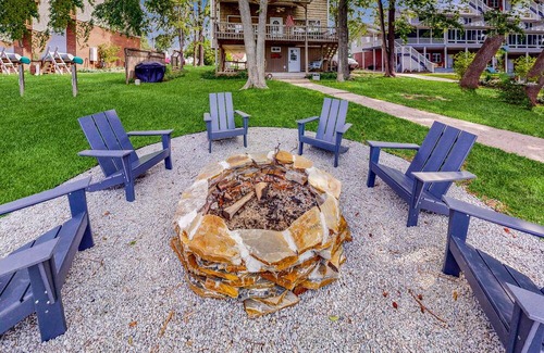 Newberry Shores House | Unique waterfront home with direct water access, dock, firepit, porch, W/D, AC