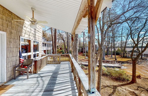 Newberry Shores House | Unique waterfront home with direct water access, dock, firepit, porch, W/D, AC