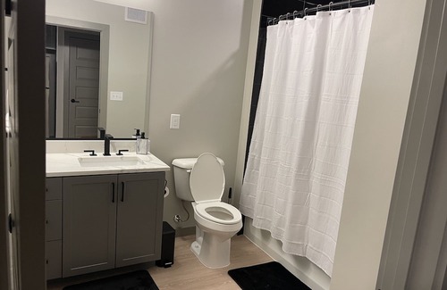 Town Center Apartment | Yellow Serenity: A perfect balance of serenity with nearby entertainment.