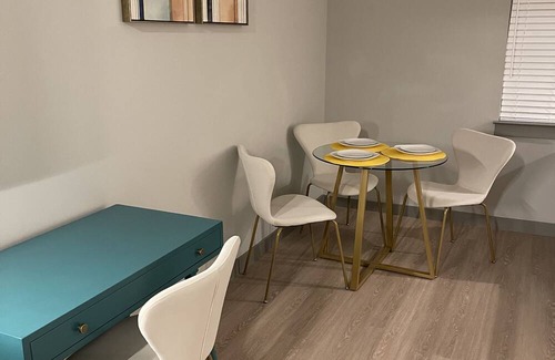 Town Center Apartment | Yellow Serenity: A perfect balance of serenity with nearby entertainment.