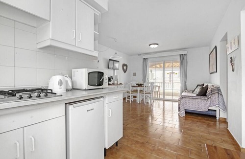 Arenal d'en Castell Apartment | Holiday Apartment "319 Castell Sol" with Shared Pool, Private Terraces & Wi-Fi