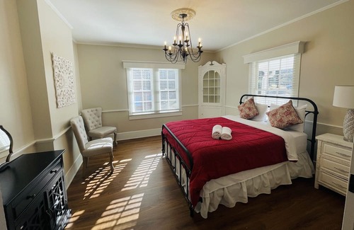 Clemmons House | Escape to serenity at our distinctive retreat, nestled behind the Excelsior at the Manor House