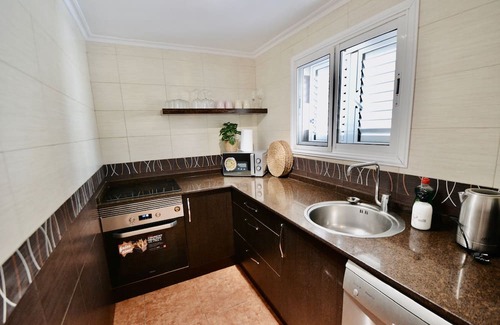 Lomo Quiebre Apartment | A tastefully designed apartment with a private balcony overlooking the harbour.