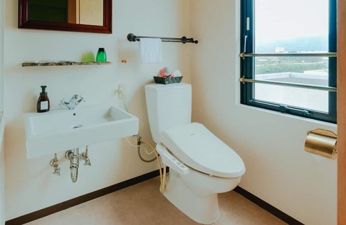 Aira House | Smoking Double Installation of Mirable Plus Ro / Aira Kagoshima