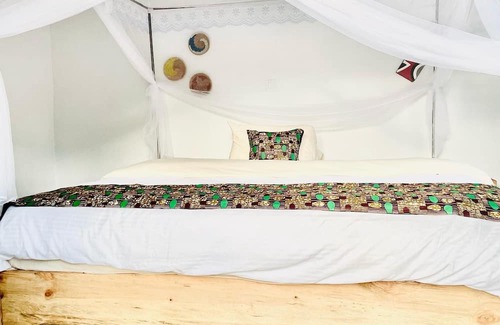 Agakera National Park Cabin | 4-bedroom peaceful village home, 5 minutes to Rwanda's Akagera National Park.