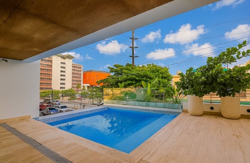 Evaristo Morales Apartment | Comfy, Very Well Appointed Centric Apt, Full AC, Fast Wi-Fi, King Bed, Pool, Gym