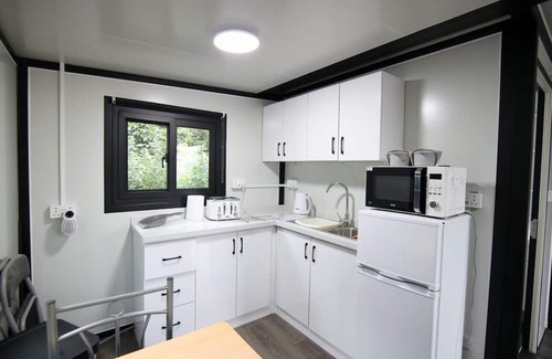 Portglenone Cabin | 2-BR Sunset Retreat Cabin HotTub& Sunset Views separate log cabin with projector