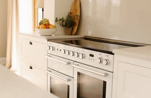 Acrefair House | A luxurious riverside cottage with stunning views, a hot tub, and fishing access.