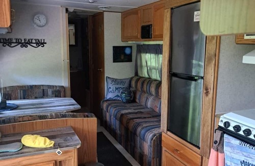 Danville RV Rental | Tranquil campsite with AC in the woods of Danville