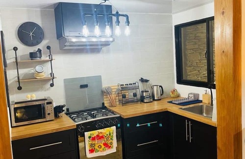 La Vega Province Cabin | 2.5-bedroom cabin in peaceful Jarabacoa with AC, WiFi. Enjoy nature