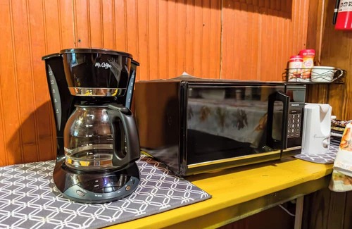 Fairview Cabin | Charming, private, 1952 log cabin in the country 4 miles from Fairview.