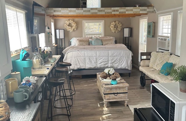 Country Farm Bliss is a rustic tiny home located on Farm.