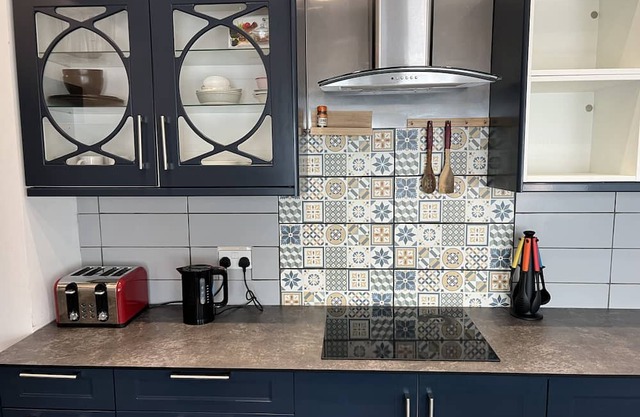 Comfortable double bedroom with shared bathroom