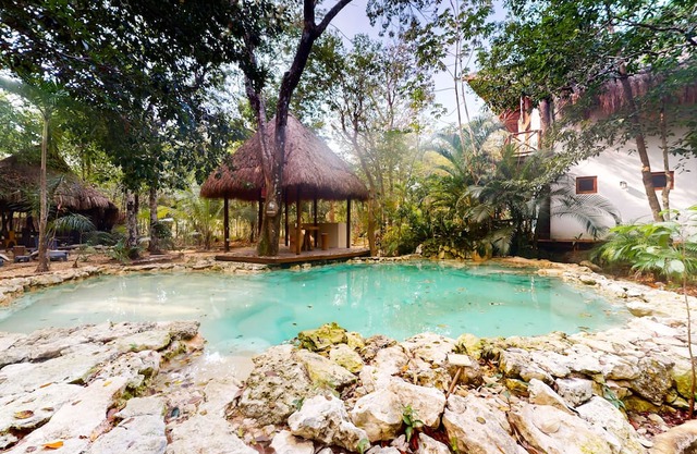 Tropical resort villa near the beach with outdoor pool, deck, streaming, washer