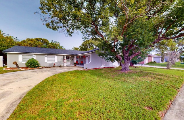 Single-story home with community pool/tennis access, grill, patio, AC, & W/D