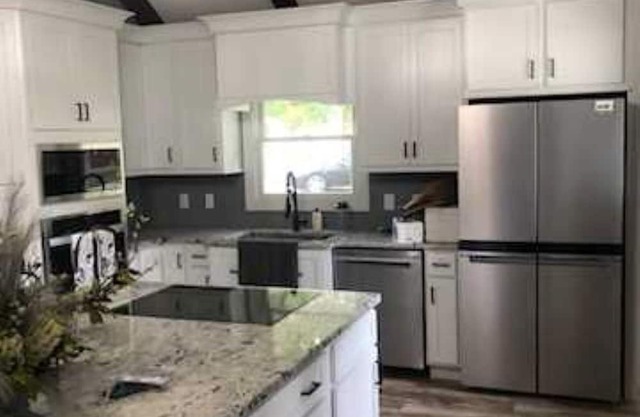 On a Grand Lake channel and walking distance to bike path, marina, and bar.