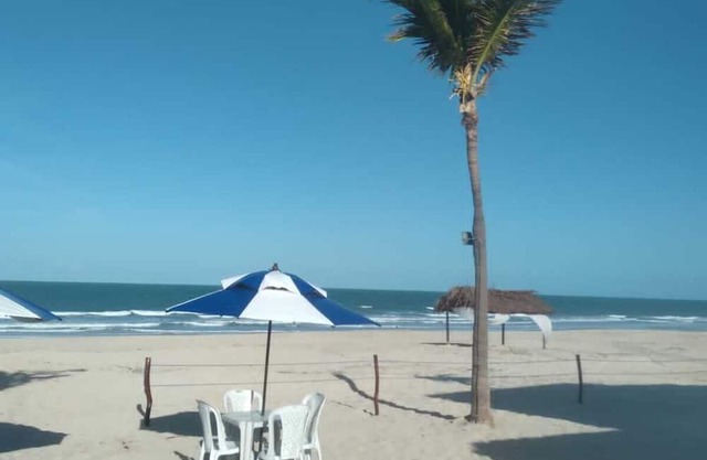 "Pé na Areia - Casa de Praia: Seu Refúgio à Beira-mar Agora ao Alcance!"