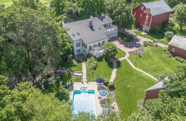 Urban Escape: 20-Acre Modern Farmhouse with Pool, Ponds & Nature Trail