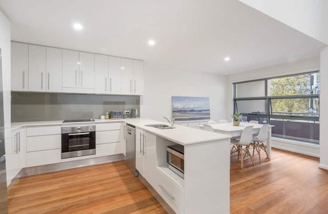 North Heaven - Modern Apartment with Balcony River Views and Pool