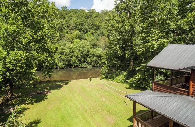 Astounding River View - Peaceful Seclusion, Hot Tub Soaks, Games & Fireside Sips