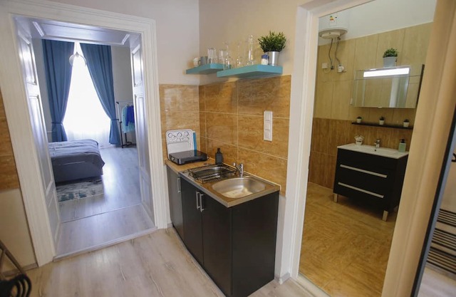 Our apartments is located in the heart of downtown, just steps from Dobó Square.